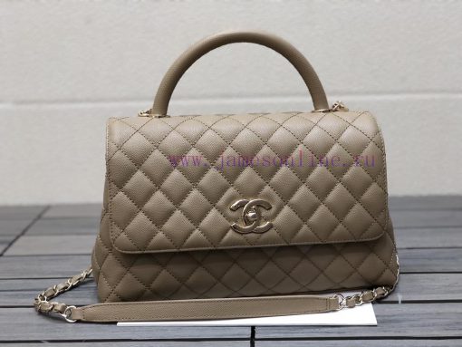 Chanel Bag 𝘾𝙃𝘼𝙉𝙀𝙇 𝟮𝟭𝙉𝙚𝙬 𝘾𝙤𝙘𝙤 𝙝𝙖𝙣𝙙𝙡𝙚The outer seam of the bag cover is designed with a built- 72btk6y3