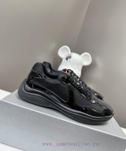 Prada Top Edition SneakersImported fly woven fabric with stitched patent leather on the uppeje9aimxm