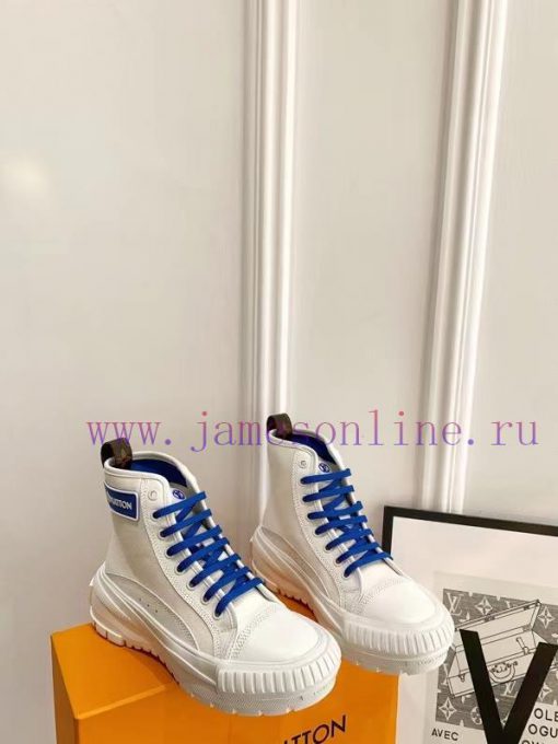 The LV Squad high top sneakers feature a blend of cotton canvas and calf leather trim, with 9mh5l9sv
