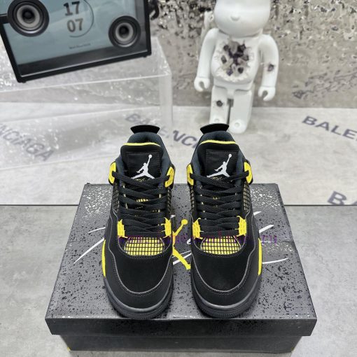 . Air Jordan 4 Black and YellowThe classic mesh window area of the Qiao 4 is sewn with a joim0c08bx2 - Image 2