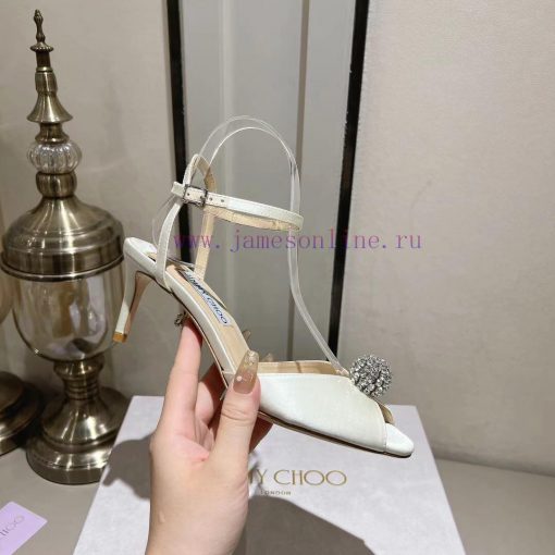 Jimmy Coo is a simple, elegant, and fashionable pair of sandalsOne button high-heeled sandal11va8yep