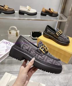 Fendi Domino loafers feature a single kick design with black leather and cowhide material ingbv8u9p3