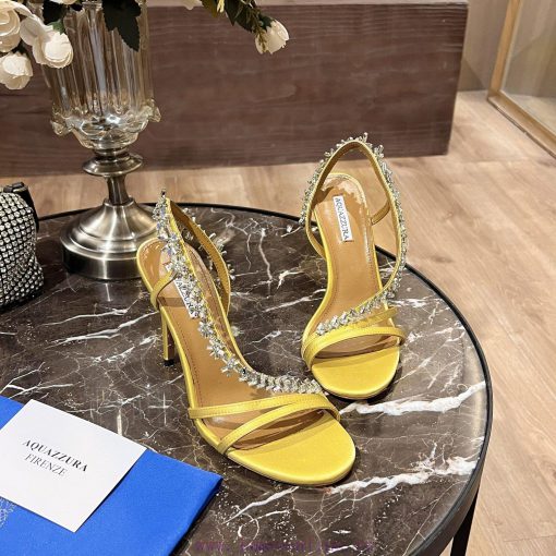 Aquazzura 2024This is a rhinestone sandal with a bohemian charm, featuring a free spirited srtnmmbnr - Image 3