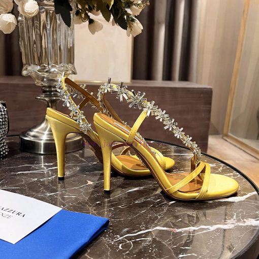 Aquazzura 2024This is a rhinestone sandal with a bohemian charm, featuring a free spirited srtnmmbnr - Image 9