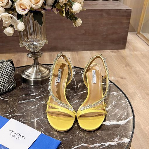 Aquazzura 2024This is a rhinestone sandal with a bohemian charm, featuring a free spirited srtnmmbnr - Image 10