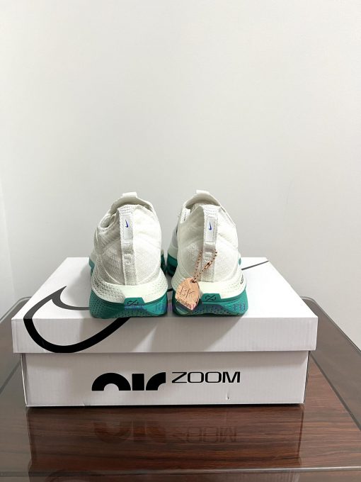 Real shot of Nike Air Zoom Alphafly Next% 2 breathable low top running shoes in white and gredha828o - Image 5
