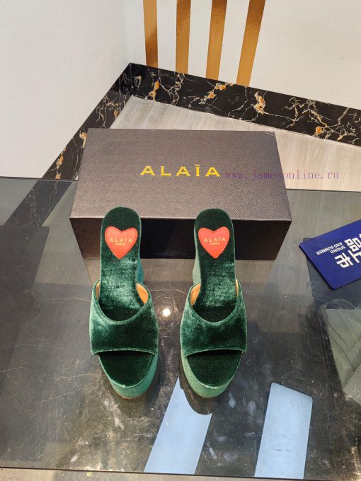 ALAIA's latest hate sky high water table slippers for 2024, with a unique heart-shaped desigledxc39o - Image 2
