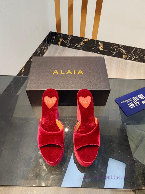 ALAIA's latest hate sky high water table slippers for 2024, with a unique heart-shaped desigbuxoruvy - Image 2