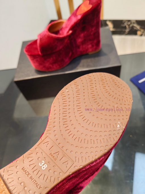 ALAIA's latest hate sky high water table slippers for 2024, with a unique heart-shaped desigbuxoruvy - Image 6