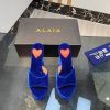 ALAIA's latest hate sky high water table slippers for 2024, with a unique heart-shaped desig2cadb9a6