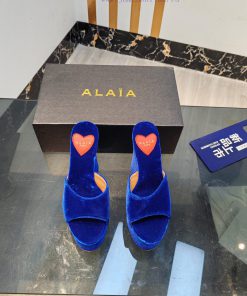 ALAIA's latest hate sky high water table slippers for 2024, with a unique heart-shaped desig2cadb9a6
