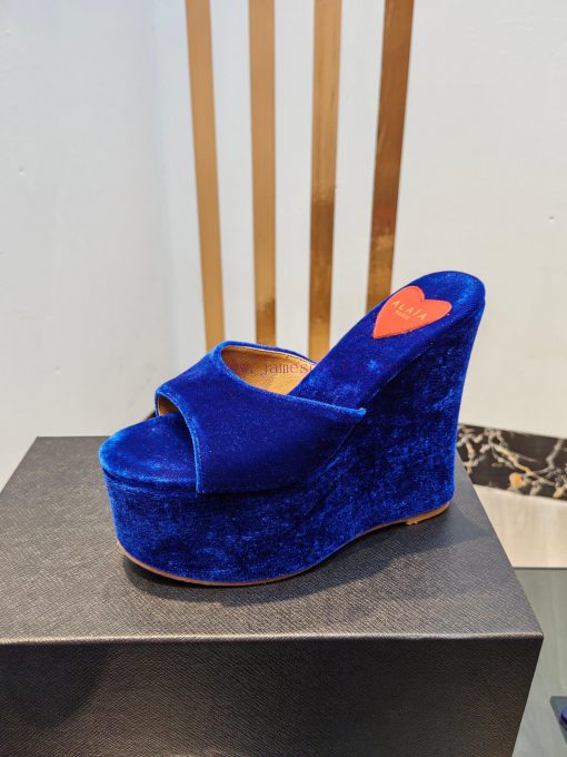 ALAIA's latest hate sky high water table slippers for 2024, with a unique heart-shaped desig2cadb9a6 - Image 10