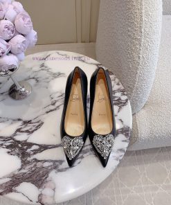 Christian Loubouti's new limited edition heart-shaped gemstone red soled high heels are a gi7dnczq1o