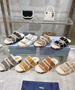 Prada slippers feature a soft lining and an iconic triangular logo, showcasing a unique binall4dbpsk