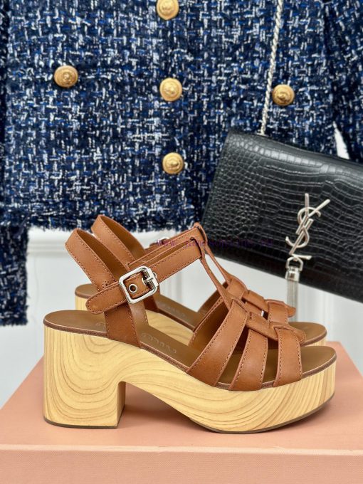 MIU MIU/Miu Miu Classic Waterproof Platform Thick Heel Pig Cage SandalsThis sandal is reallywx6ce27w