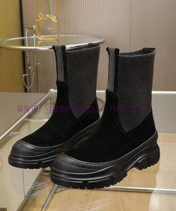 The Brunello Cucinelli boots, inspired by the classic Le Fu shoes, define the modern and elevit1lows