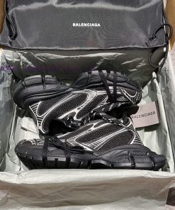 Top Balenciaga 3xl mesh distressed lace up low top dad shoes in black and white. The exterioqmjs2cku
