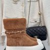 Chanel | Chanel Classic Autumn/Winter Double CThick soled snow bootsA pair of snow boots thaavr4yerg