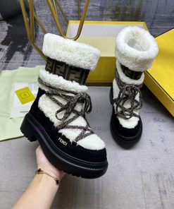 FENDI round toe apres ski boots, white lambhair+black suede details, jacquard fabric details85k1915g
