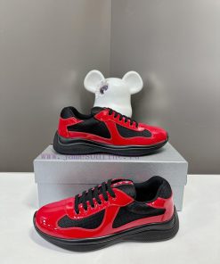 Prada Top Edition SneakersImported fly woven fabric with stitched patent leather on the uppe4kleylm0