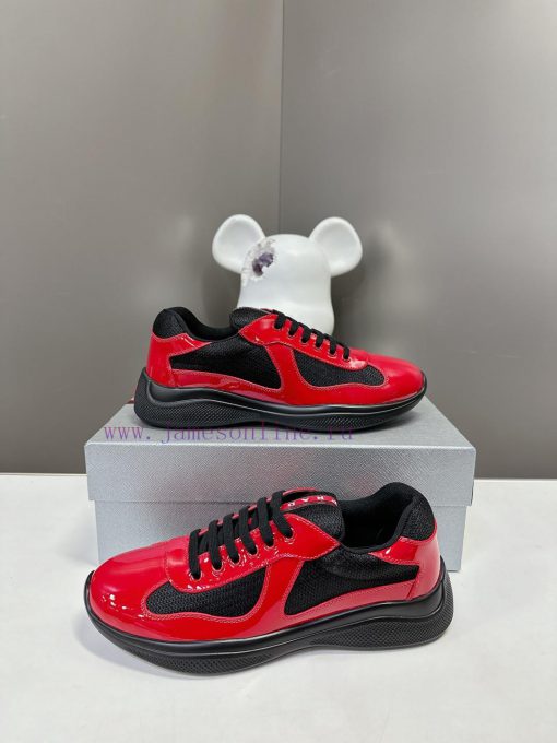 Prada Top Edition SneakersImported fly woven fabric with stitched patent leather on the uppe4kleylm0