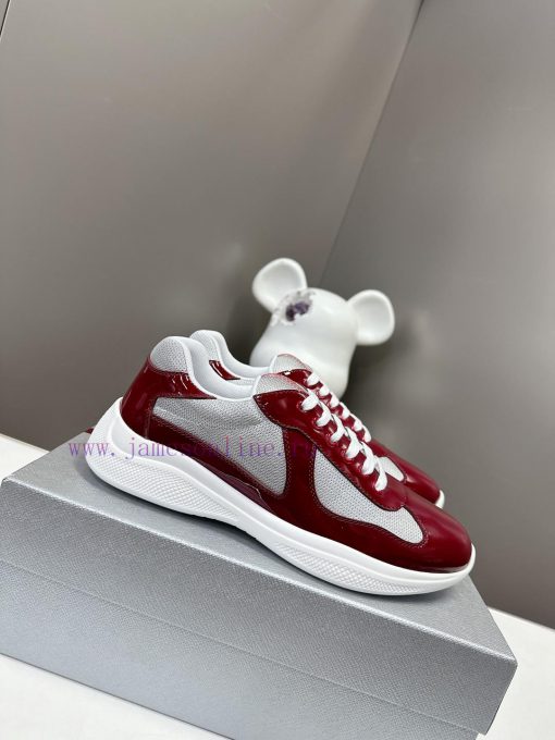 Prada Top Edition SneakersImported fly woven fabric with stitched patent leather on the uppev8jgwqj7