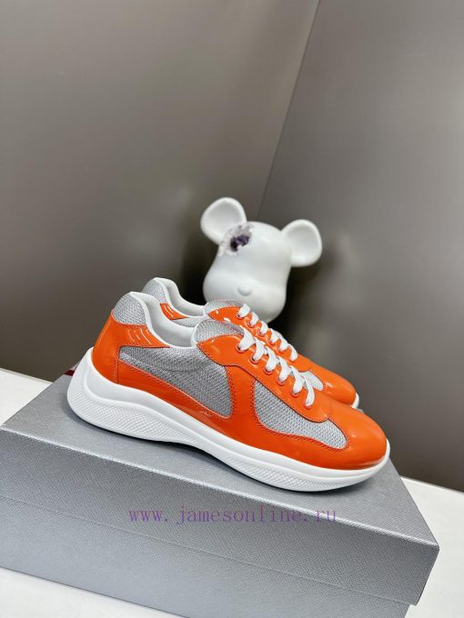 Prada Top Edition SneakersImported fly woven fabric with stitched patent leather on the uppedx4vjozi