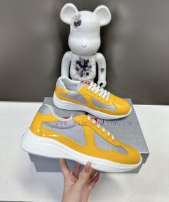 Prada Top Edition SneakersImported fly woven fabric with stitched patent leather on the uppemok4by0l