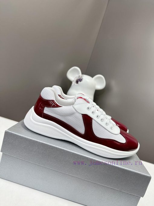 Prada Top Edition SneakersImported fly woven fabric with stitched patent leather on the uppe9cd35d14