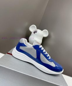 Prada Top Edition SneakersImported fly woven fabric with stitched patent leather on the uppevgg7lo97