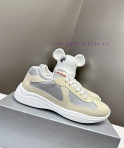 Prada Top Edition SneakersImported fly woven fabric with stitched patent leather on the uppende8hgja