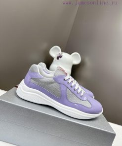 Prada Top Edition SneakersImported fly woven fabric with stitched patent leather on the uppe3zzi33km