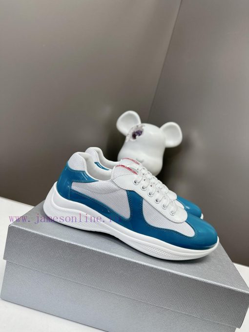 Prada Top Edition SneakersImported fly woven fabric with stitched patent leather on the uppepaoen0zx