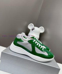 Prada Top Edition SneakersImported fly woven fabric with stitched patent leather on the uppe6gzognle