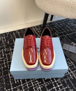 Prada 24ss autumn and winter latest thick soled lace up punched block sponge shoesThe origine4dj0qoo
