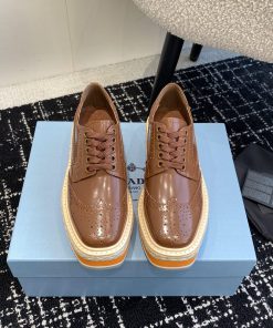 Prada 24ss autumn and winter latest thick soled lace up punched block sponge shoesThe origint95pt83m