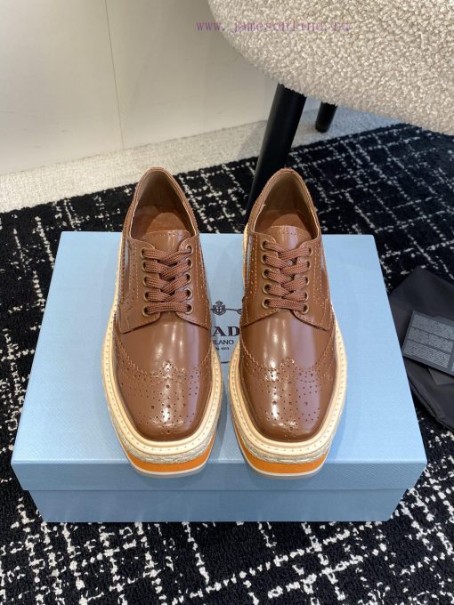 Prada 24ss autumn and winter latest thick soled lace up punched block sponge shoesThe origint95pt83m