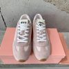 Miu Miu's new retro German training shoes can be paired with minimalist, retro, and artistic9jq9vhu5