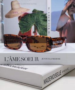 Balenciaga's popular spring/summer 2024 collection, futuristic sunglasses, sporty and minimao9a86oop