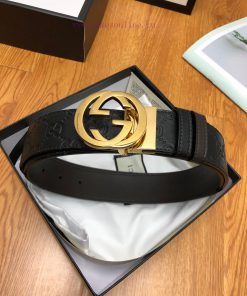 Gucci, double-sided belt, with Gucci Signature leather on one side and monochrome leather on y9l0autm