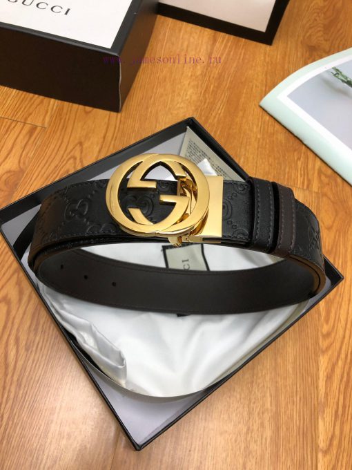 Gucci, double-sided belt, with Gucci Signature leather on one side and monochrome leather on y9l0autm