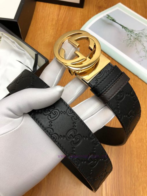 Gucci, double-sided belt, with Gucci Signature leather on one side and monochrome leather on y9l0autm - Image 4