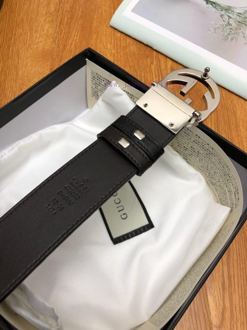 Gucci, double-sided belt, with Gucci Signature leather on one side and monochrome leather on mmrvay2s - Image 9