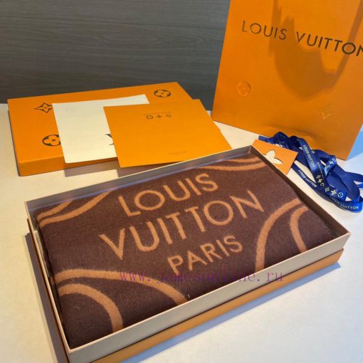 The "LV" scarf presents a large Monogram floral design in a wide format, conveying the visuaw57utwe1 - Image 8