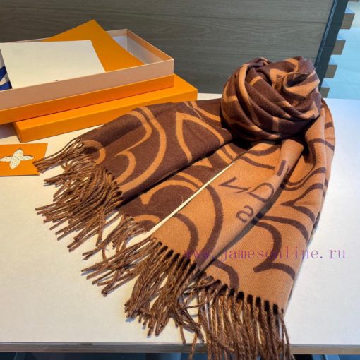 The "LV" scarf presents a large Monogram floral design in a wide format, conveying the visuaw57utwe1 - Image 10