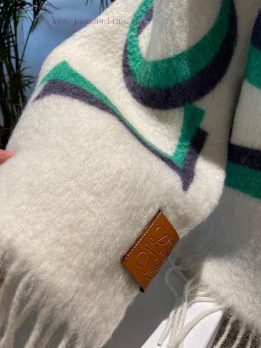 Loewe's new gradient wool mohair scarf is a Stockholm inspired warm color that falls in lovejm4oc7er - Image 9