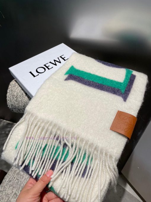 Loewe's new gradient wool mohair scarf is a Stockholm inspired warm color that falls in lovejm4oc7er - Image 12