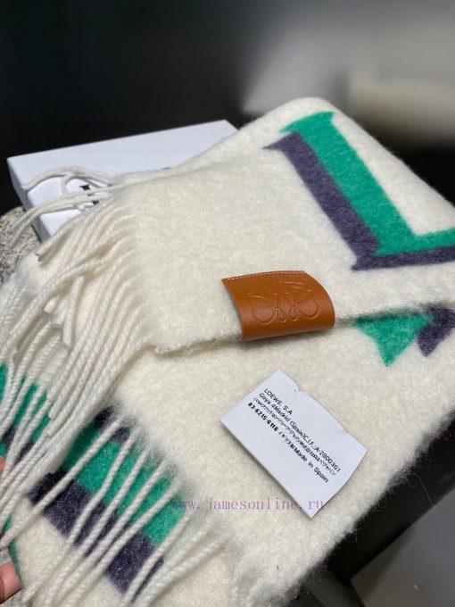 Loewe's new gradient wool mohair scarf is a Stockholm inspired warm color that falls in lovejm4oc7er - Image 13