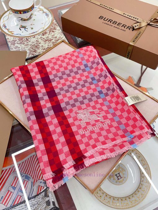 Burberry's top of the line high-end products, paired with the plaid in the scarf, exude a luz8degi68 - Image 4