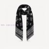 The Amazing Long Scarf features Monogram elements pieced together, referencing the intricatehpt4vcji